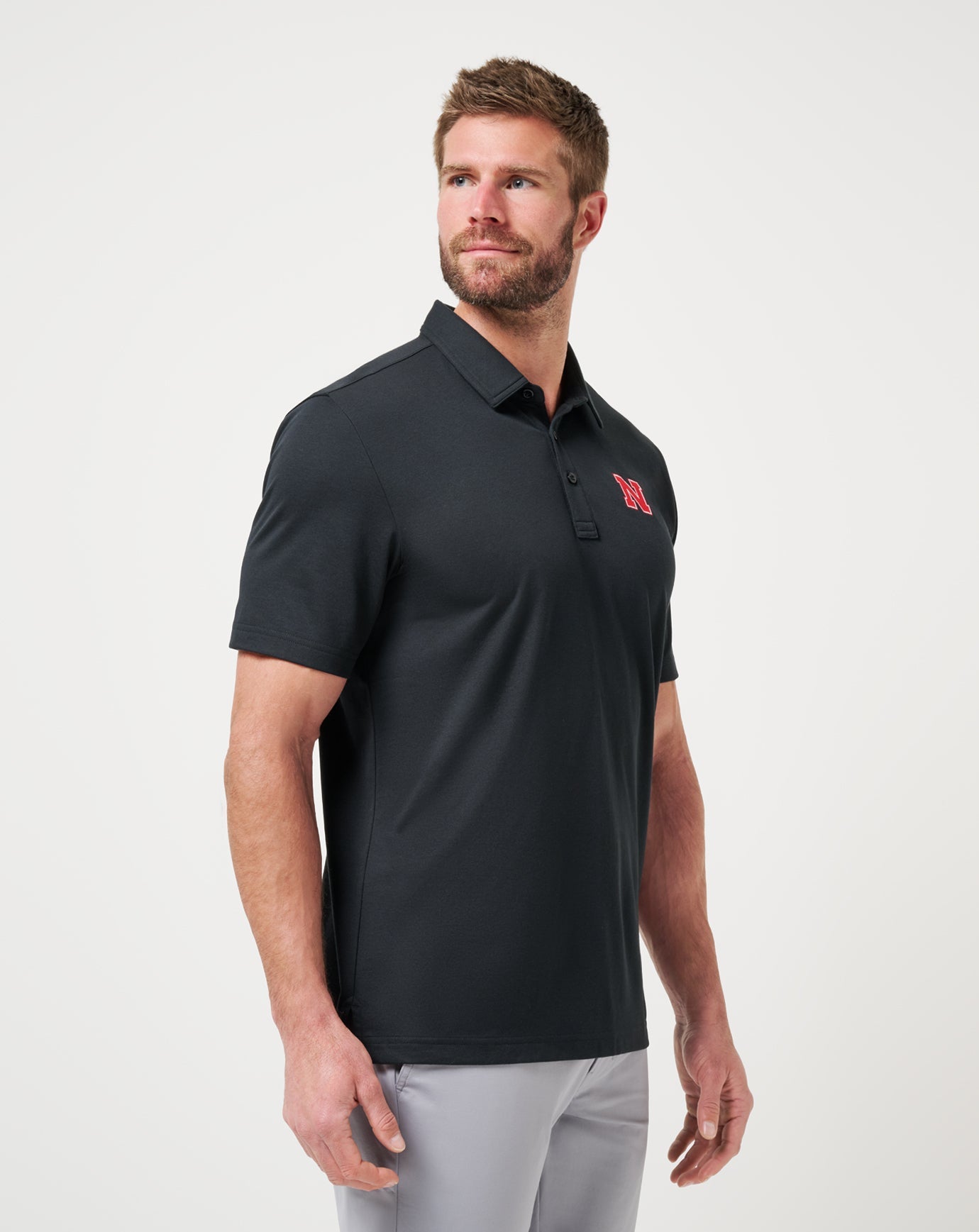 Travis Mathew Nebraska School Pride Polo